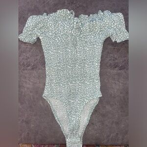 Green and white HELLO MOLLY  off the shoulder bodysuit.